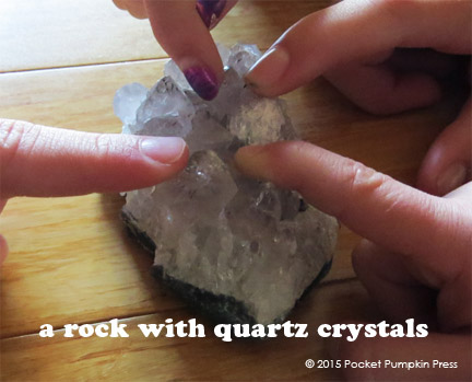 class touching quartz crystals